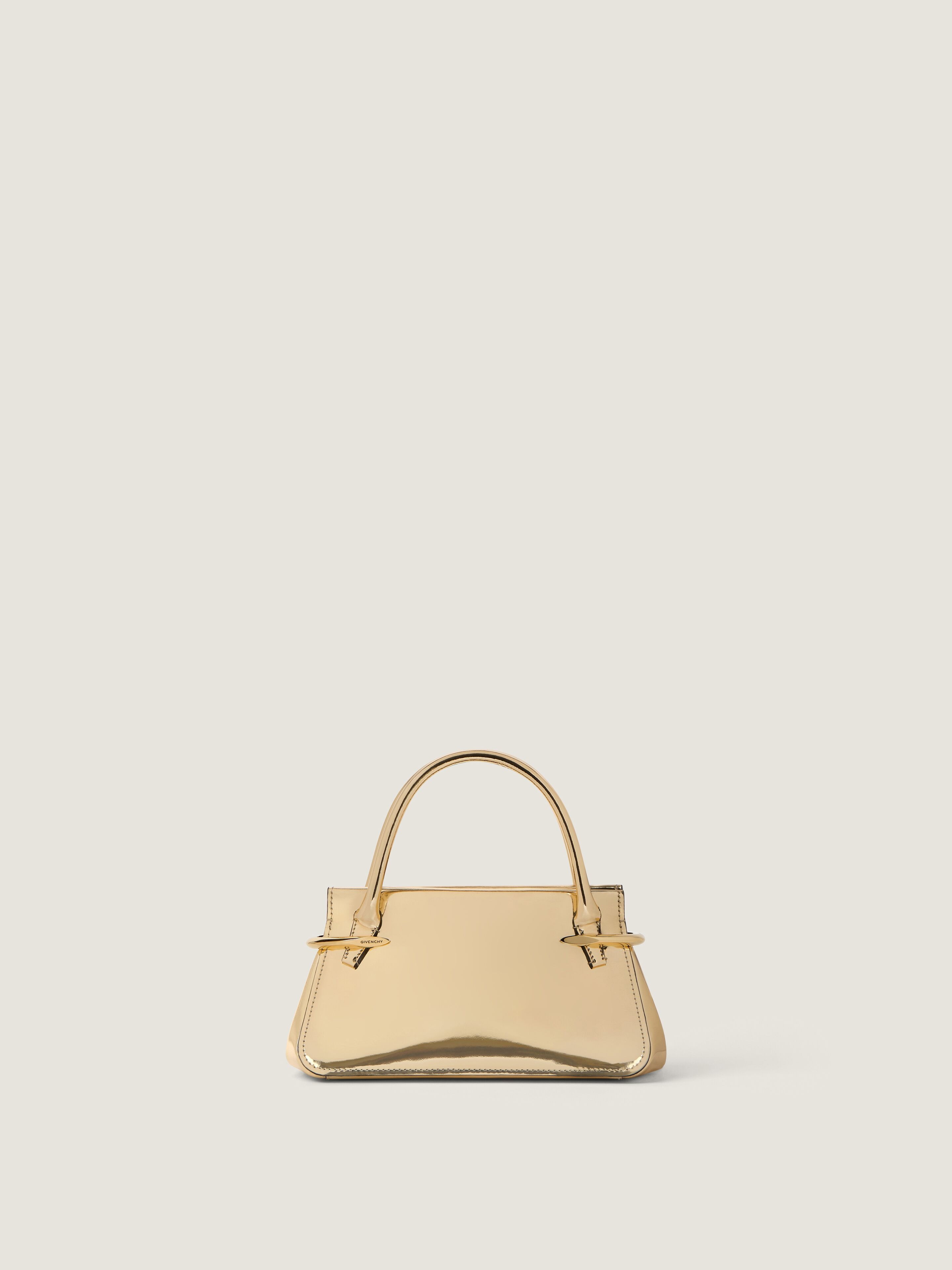 Mini Pinch bag in mirror effect leather